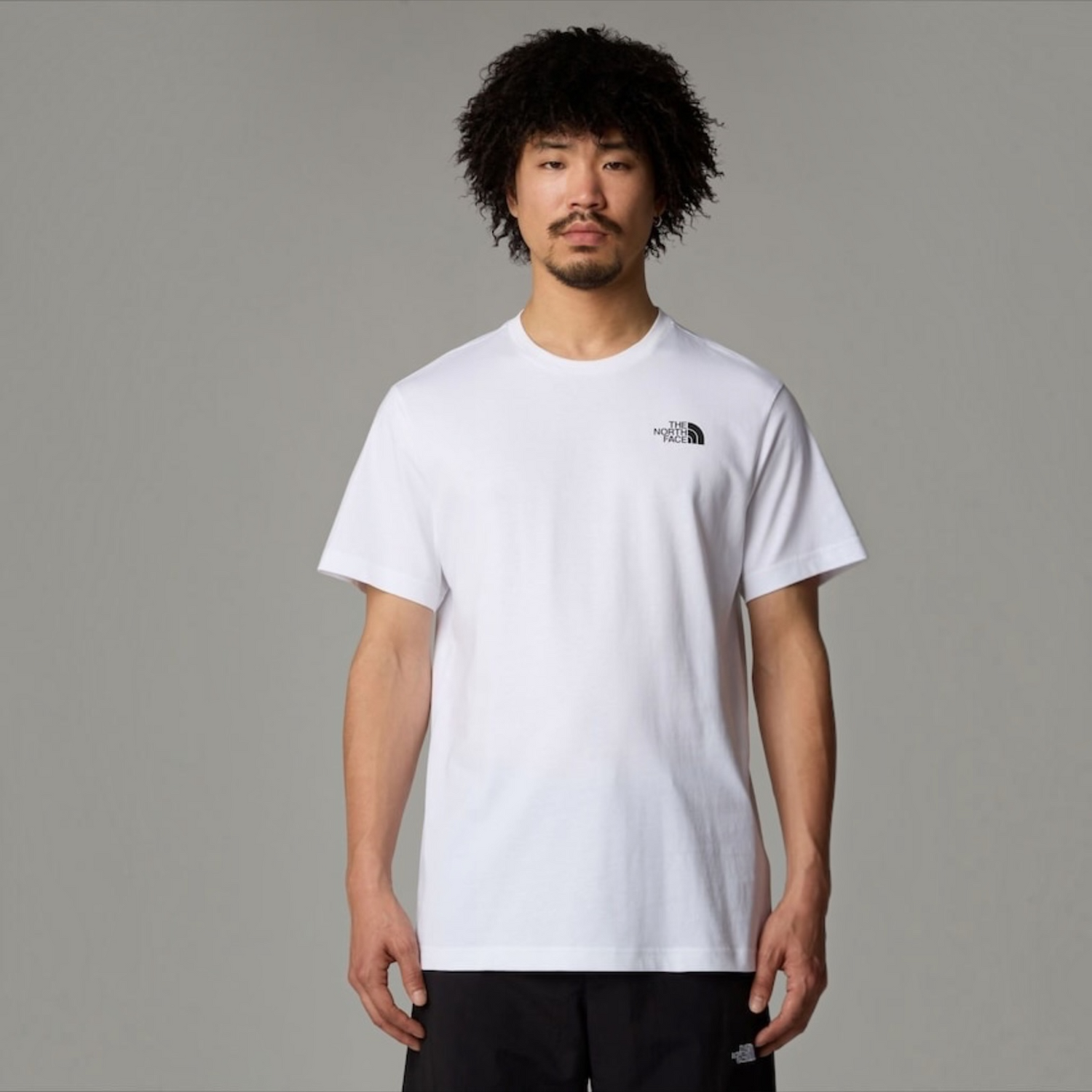 The North Face men’s white Vertical Logo T-shirt with small black chest logo
